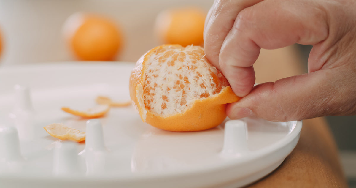 Einhandteller-Frau-Kettner-Teller-0034966003799-Mandarine-schaelen-lafueliki